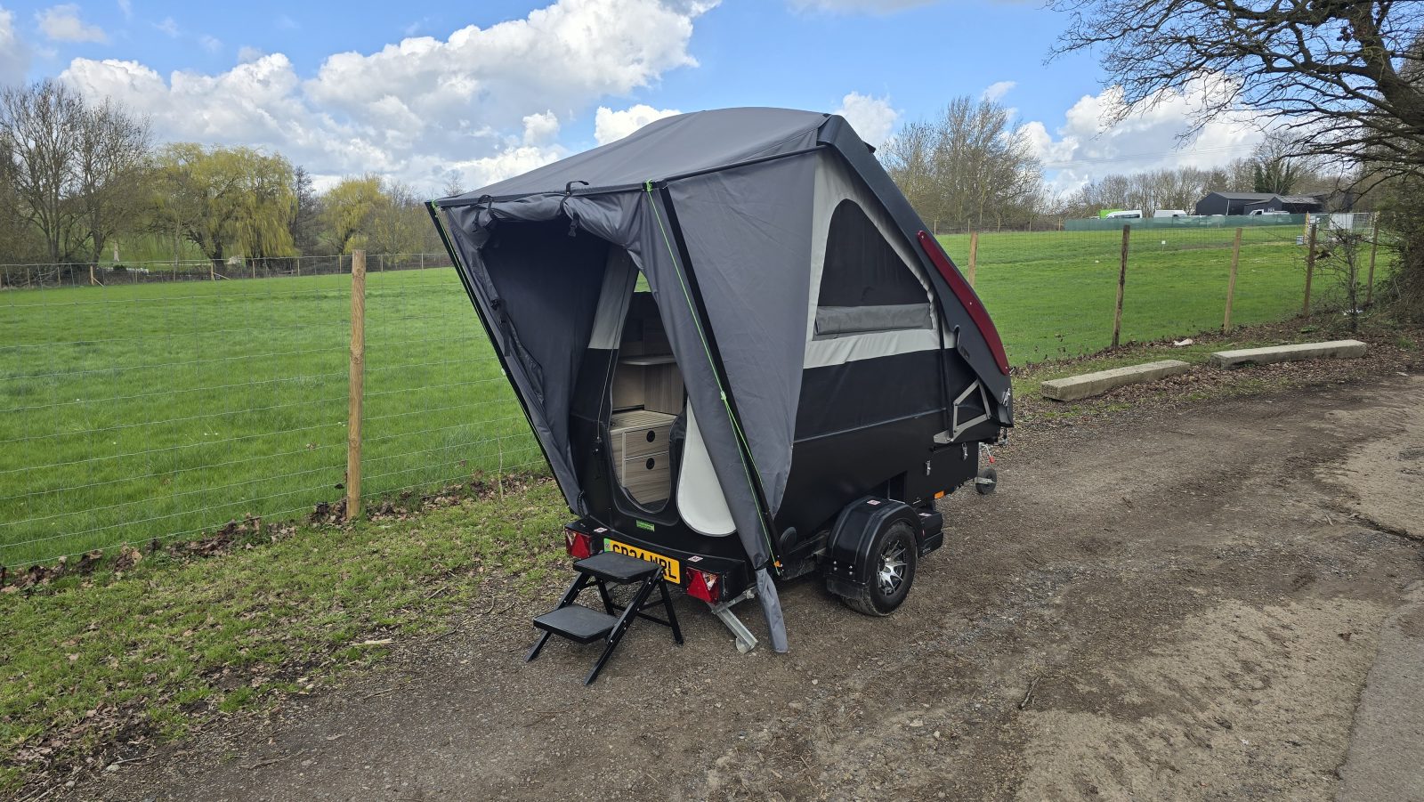 ECT2 set up with awning used as a porch